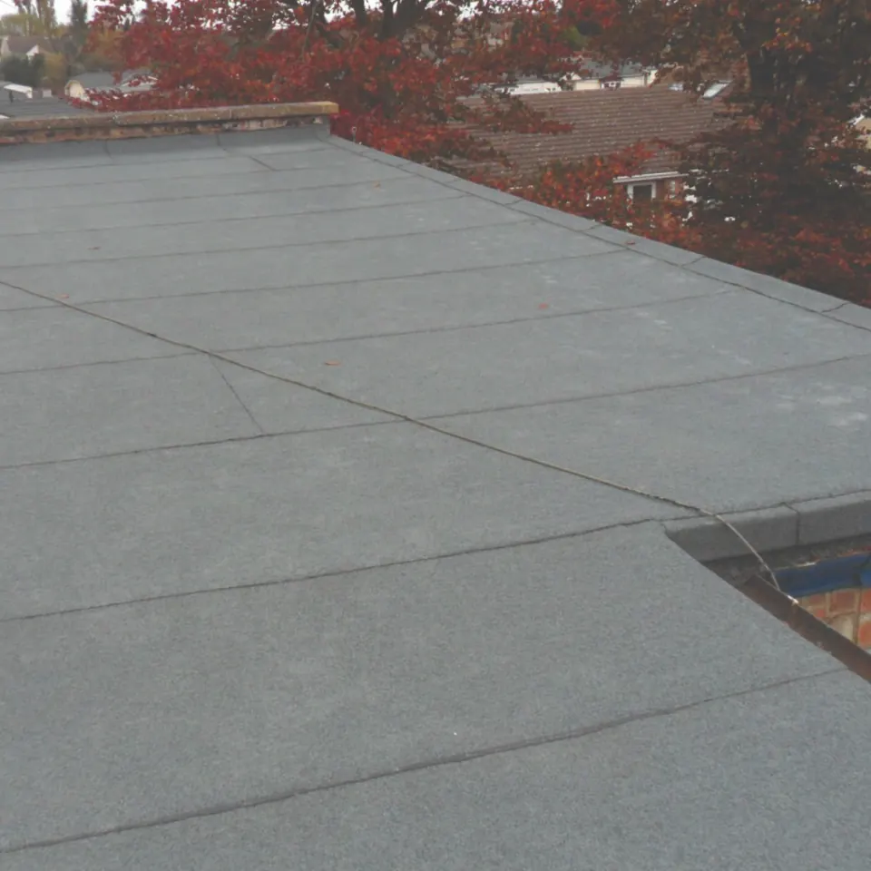 Flat roof finished in green mineral felt