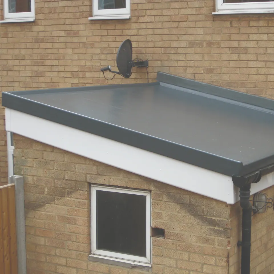 New flat roof and white fascia on a single-storey extension
